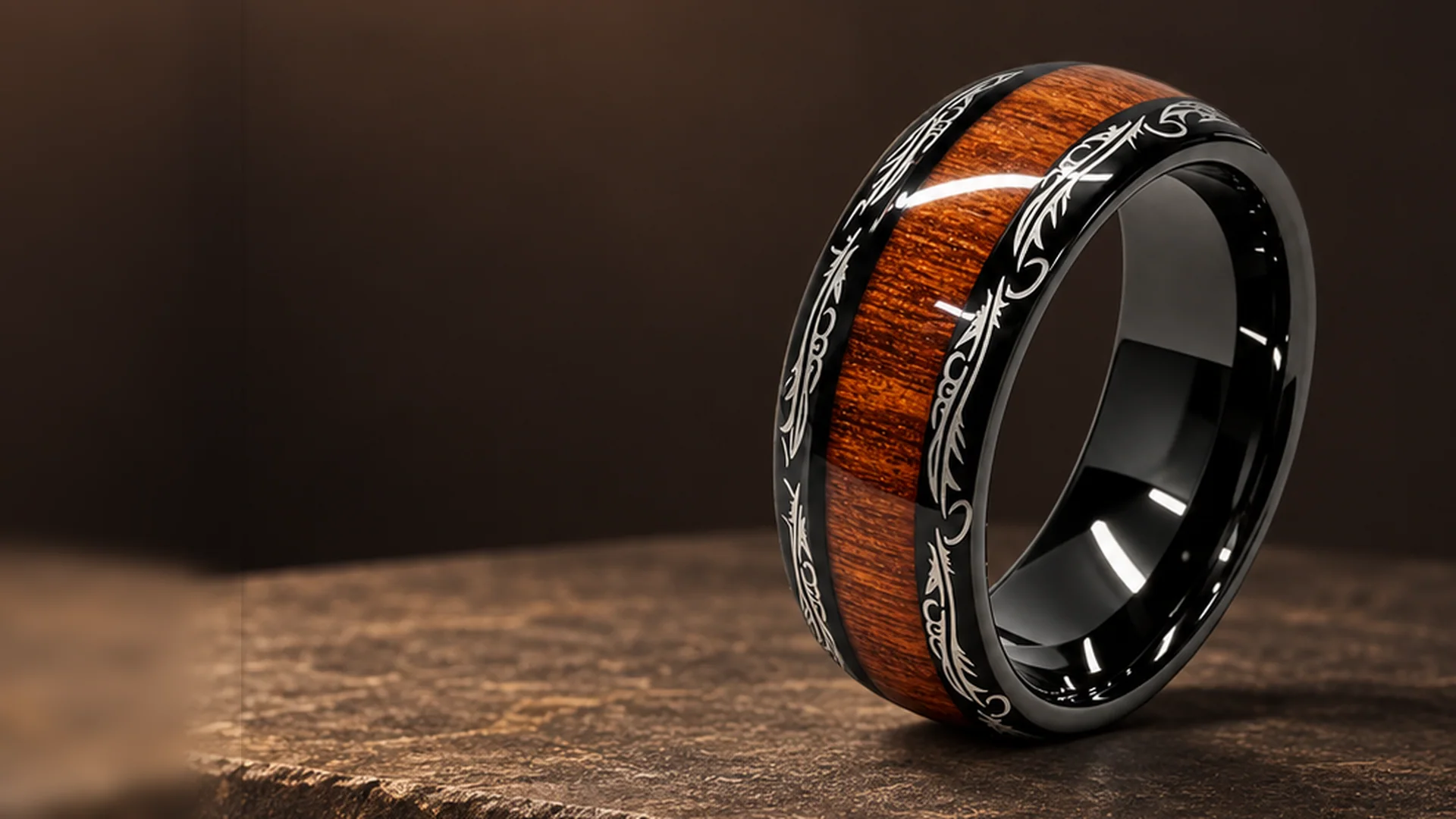 Black tungsten ring with acacia wood inlay standing on a stone block